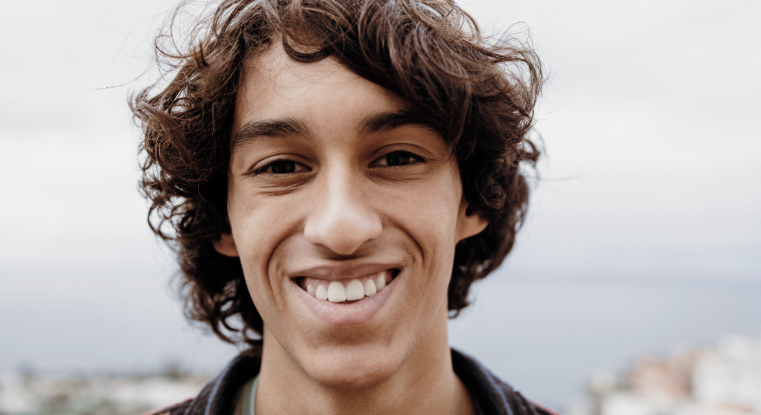 Young man smiling at the camera