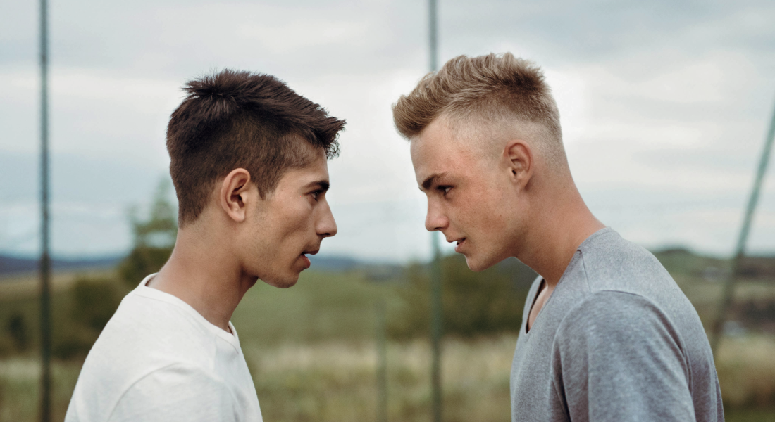two boys facing off