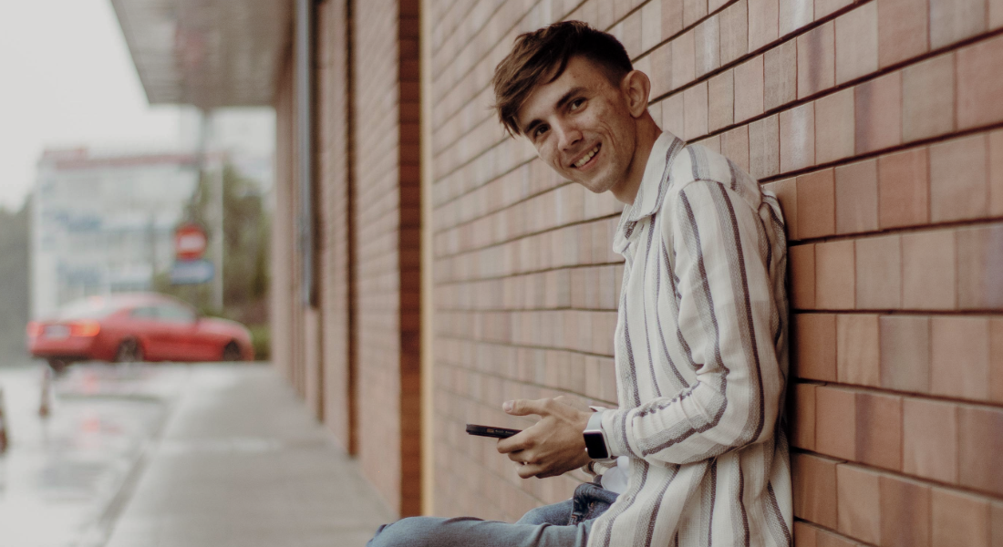 young man on his phone